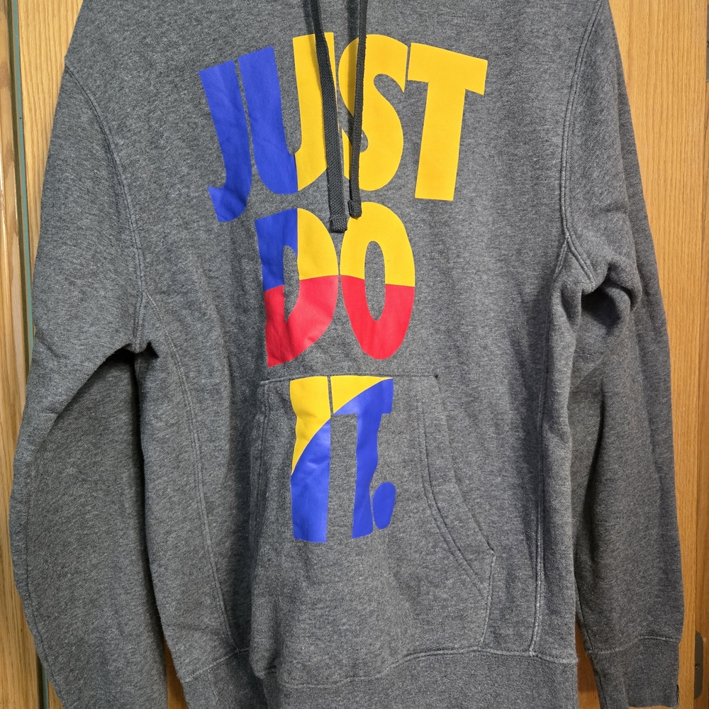 Nike Gray Hoodie with Bold Multicolor Design